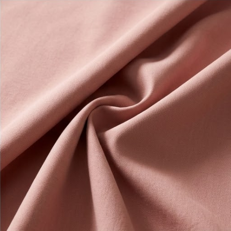 Muted Blush Solid Woven Grommet Curtain Panel